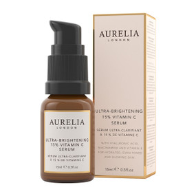 Aurelia London Ultra Brightening 15% Vitamin C Serum -comes in a 15-ml amber glass bottle with a black pump, pink label, and pink carton box.