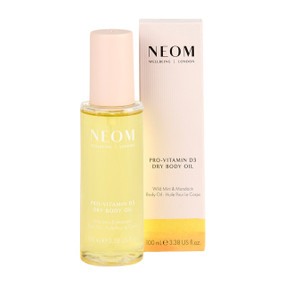 Neom Wellbeing Pro-Vitamin D3 Dry Body Oil 100ml glass tube & cardboard box; enriched with Pro-Vitamin D3 and five botanical oils, deeply hydrates and supports skin barrier repair.