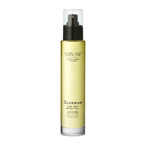 Olverum Dry Body Oil, 100mL in a glass spray bottle. Olverum Dry Body Oil is a fast-absorbing, dry oil for skin and hair.