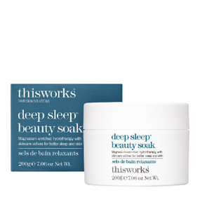 This Works Deep Sleep Beauty Soak 200g in a white plastic box & blue box;  This Works bath salts ease muscle tension, promote restful sleep, and hydrate skin.